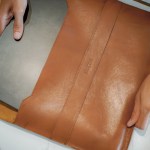Leather Sleeve Pouch Bag BUCINI Fitri - Cognac